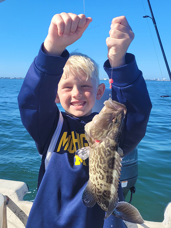Sarasota Fishing Charter - Kid with a grouper